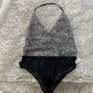 New dynamite bodysuit
